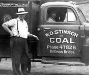 Image from the 1930s depicts the founder of W.O. Stinson & Son standing proudly in front of a coal delivery truck