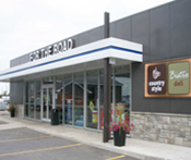 Image of a Stinson retail store named '... For The Road store' along with an adjoining gas station